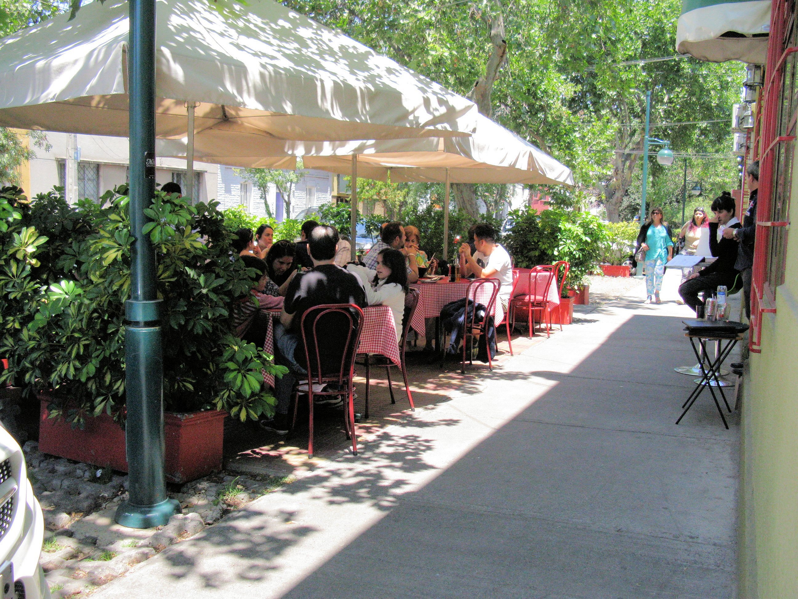 Barrio Italia is known for shaded streets, sidewalk cafes, fine dining, and courtyard homes