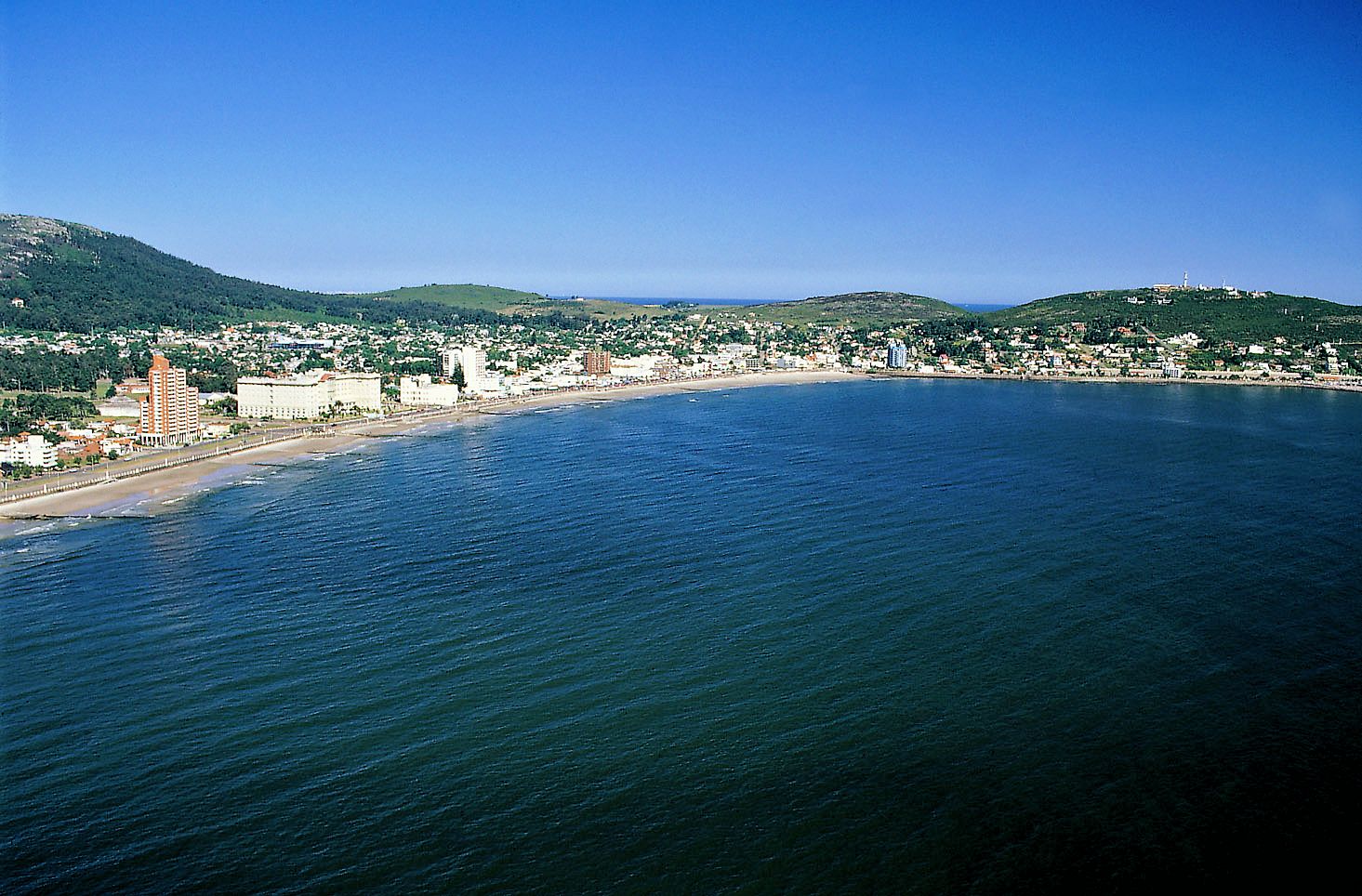 Pretty beaches and old fashioned downtown backed by rolling hills