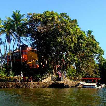 Colorful two story hose on an island in Las Isletas, Nicaragua