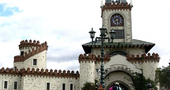 the clock tower, castle-like city gates of Loja Ecuador
