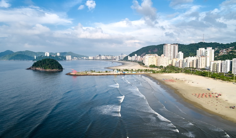 Aerial view of Santos city, buildings on the waterfront avenue, county seat of Baixada Santista, on the coast of Sao Paulo state, Brazil.