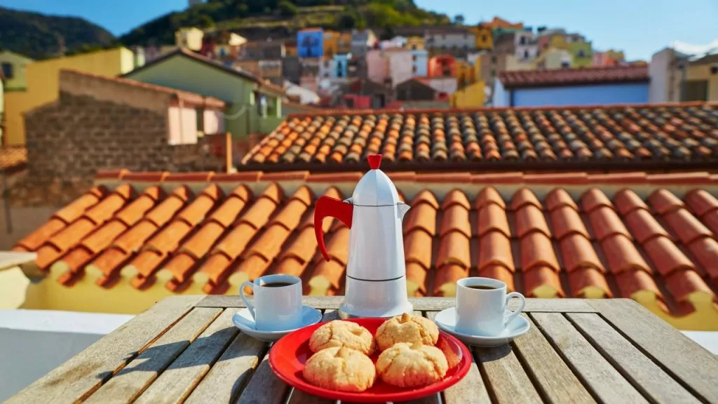 Coffee and sweets on a terrace in the Italian countryside.