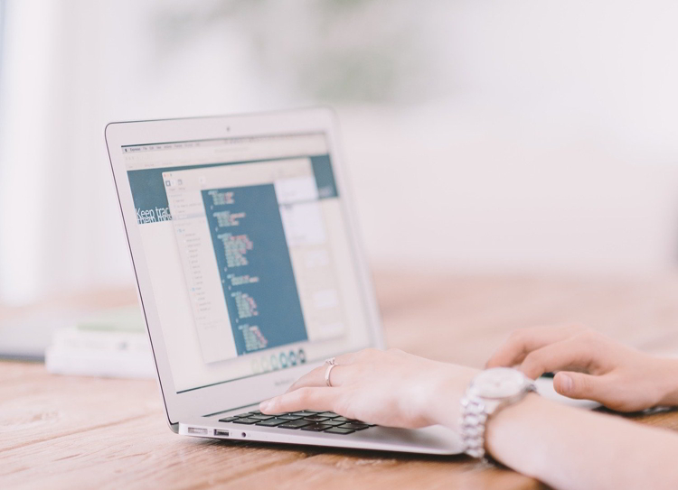 A woman using her laptop