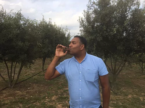 A man kissing a truffle