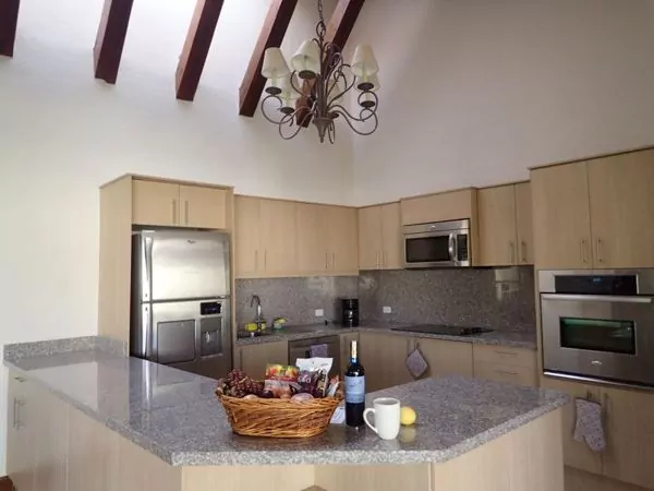The spacious kitchens offer granite counters and stainless-steel appliances 