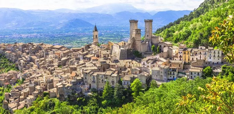 aerial view of abruzzo, italy town sorrounded by green foliage