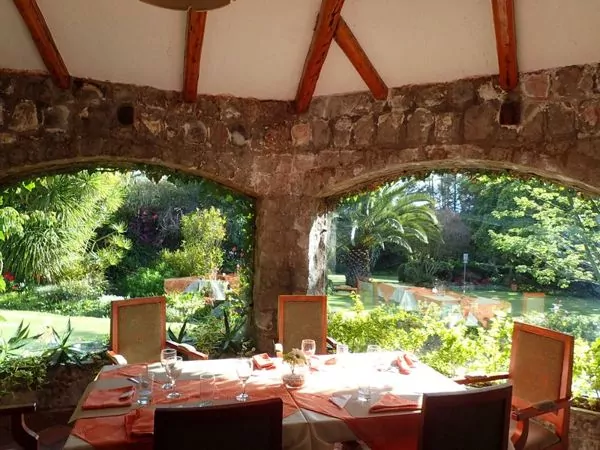 Overlooking the outdoor pool, the restaurant’s dining room is stunning 