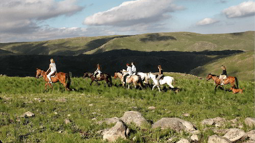 People riding horses in Argentina