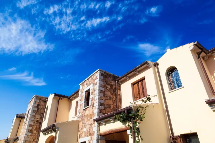 A house and a bright blue sky