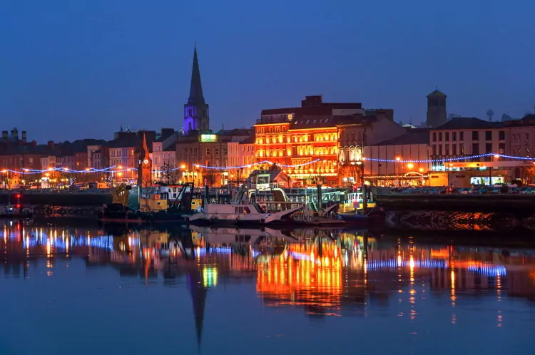 Waterford, Ireland. Panoramic view of a cityscape at night