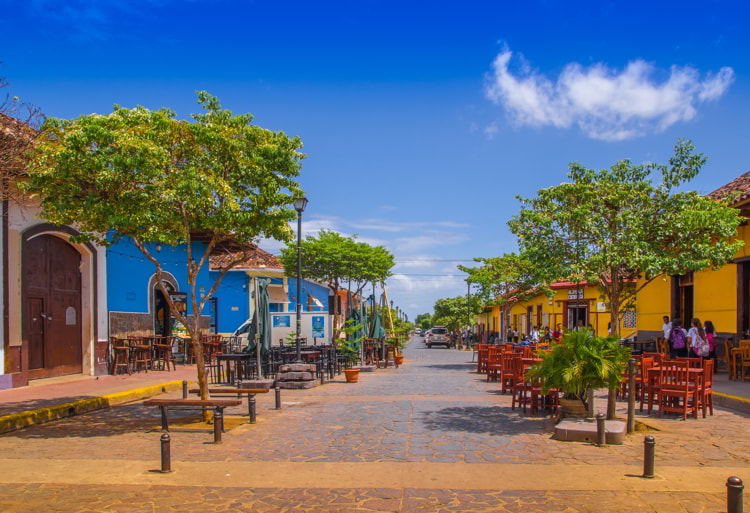 View of market stalls at a colorful street in Granada, Nicaragua