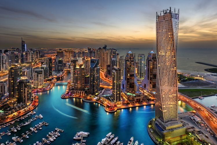 A marina in Dubai at night