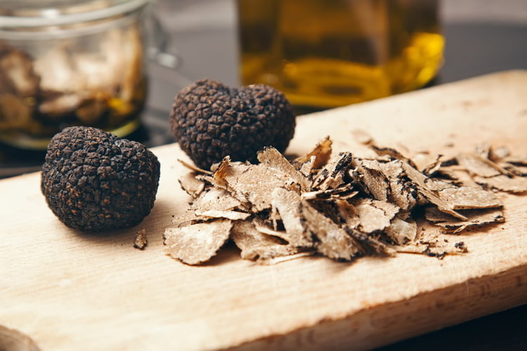 Black truffles in a table
