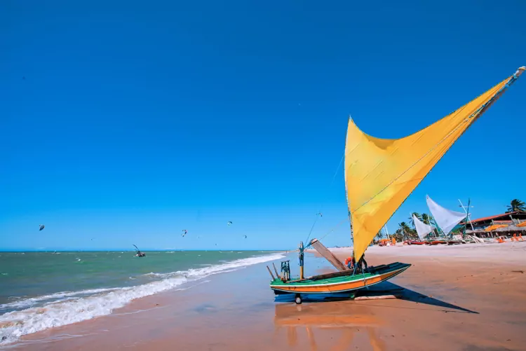 Raft or Jangada, typical sail boat from Brazil Northeast, used for fishing and for tourism in Cumbuco Beach, Ceara, Brazil.