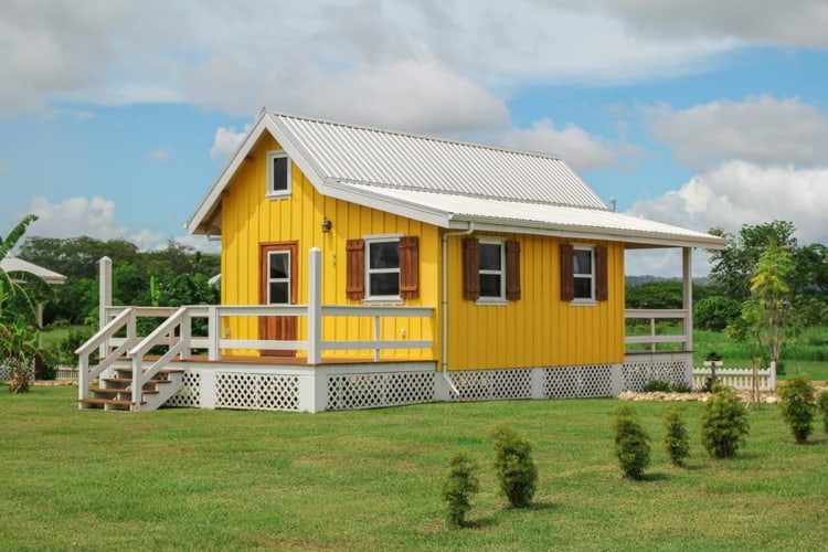 A yellow tiny home in Belize