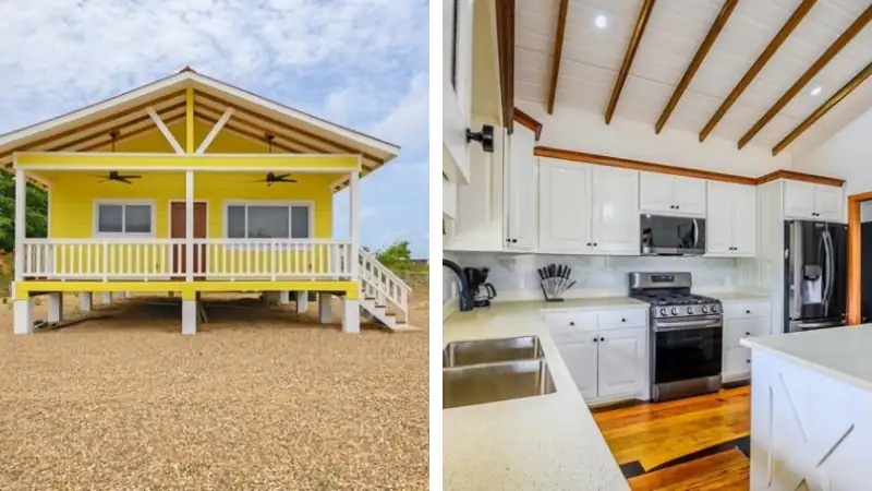 bright yellow raised cottage with a front porch is shown alongside a clean, modern kitchen interior featuring white cabinets, wood beam ceilings, and warm wood flooring.