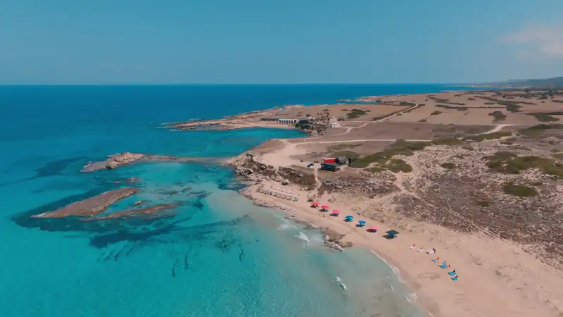 People enjoy Ayfilon Beach in Karpaz, North Cyprus
