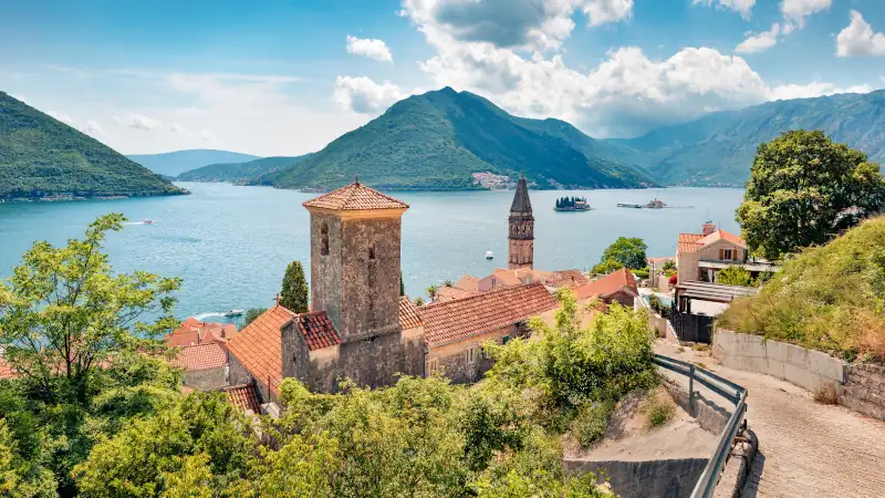 Exciting summer view of Perast town. Wonderful morning scene of Kotor Bay, Montenegro, Europe.