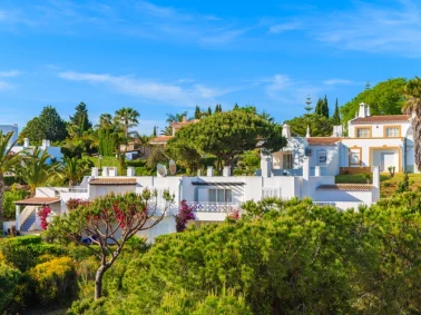 Garden with typical holiday apartments in Carvoeiro town, Algarve region, Portugal Property